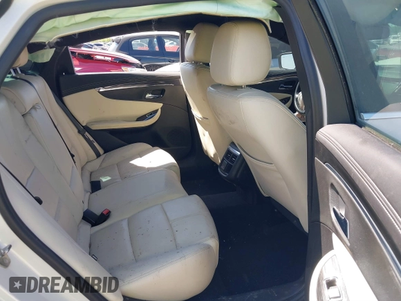 2018 Chevrolet Impala LT with VIN 1G1105S34JU106107, listed as a IAAI auction lot 41871693 with 111,412 mi miles and . Bid and sale history available at DreamBid. Image 8.