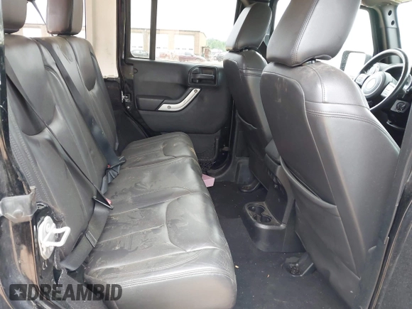 2015 Jeep Wrangler Unlimited Rubicon with VIN 1C4BJWFG7FL688728, listed as a IAAI auction lot 42054304 with 100,152 mi miles and . Bid and sale history available at DreamBid. Image 8.