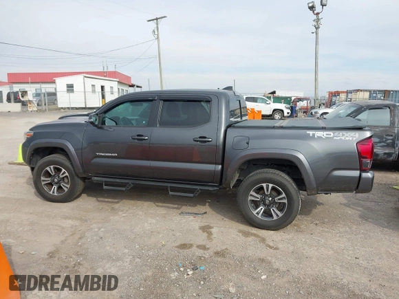 2018 Toyota Tacoma SR with VIN 3TMCZ5AN0JM150540, listed as a IAAI auction lot 41683174 with 78,553 mi miles and . Bid and sale history available at DreamBid. Image 14.