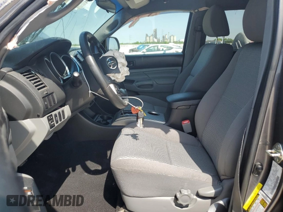 2014 Toyota Tacoma PreRunner with VIN 5TFJU4GN3EX061312, listed as a Copart auction lot 56102125 with 128,599 mi miles and Clean title. Bid and sale history available at DreamBid. Image 7.