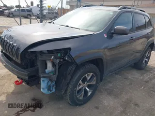 2015 Jeep Cherokee Trailhawk z VIN 1C4PJMBS3FW520328, wystawiony jako IAAI lot #41746017 z przebiegiem 83 485 mil mil oraz . Historia ofert i sprzedaży dostępna na DreamBid. Obrazek 18.
