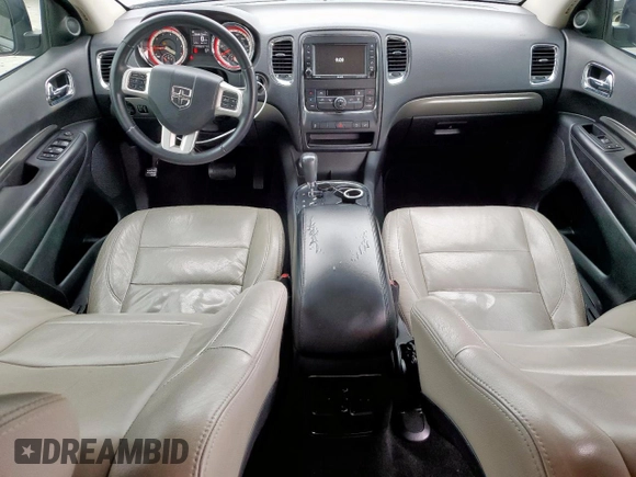2013 Dodge Durango SXT z VIN 1C4RDHAG4DC685467, wystawiony jako Copart lot #60140355 z przebiegiem 173 752 mil mil oraz Czysty tytuł • Clean title. Historia ofert i sprzedaży dostępna na DreamBid. Obrazek 8.