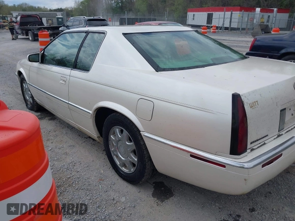 1997 Cadillac Eldorado Touring with VIN 1G6ET1293VU604921, listed as a IAAI auction lot 42113040 with 57,029 mi miles and . Bid and sale history available at DreamBid. Image 3.