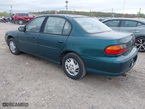 1998 Chevrolet Malibu with VIN 1G1ND52M8WY142896, listed as a IAAI auction lot 42074243 with 118,401 mi miles. Bid and sale history available at carsss.com. Image 3.