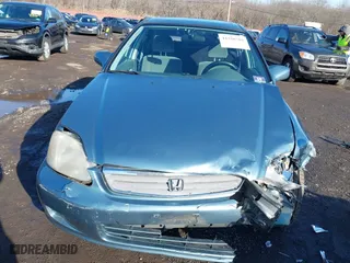 2000 Honda Civic EX with VIN 1HGEJ8649YL047194, listed as a IAAI auction lot 41526765 with 127,697 mi miles. Bid and sale history available at carsss.com. Image 12.