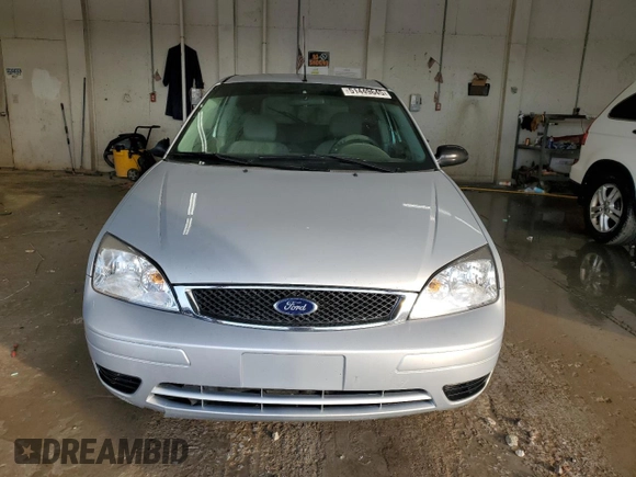 2007 Ford Focus S with VIN 1FAFP31N47W129857, listed as a Copart auction lot 51449645 with 146,360 mi miles and Salvage Title. Bid and sale history available at DreamBid. Image 5.