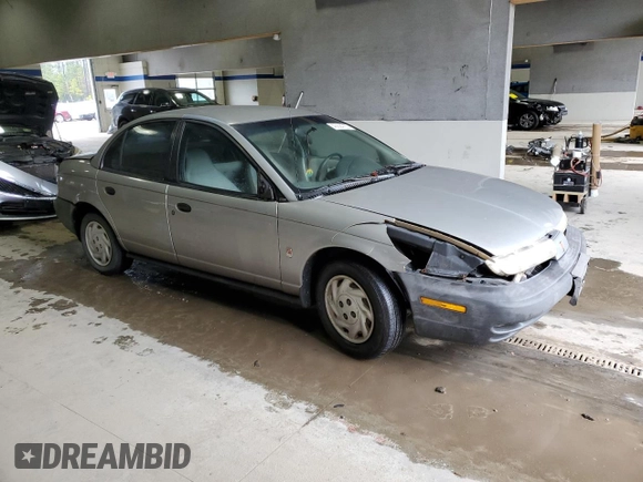 1998 Saturn SL with VIN 1G8ZF5285WZ204569, listed as a Copart auction lot 43624765 with 318,544 mi miles and Salvage Title. Bid and sale history available at carsss.com. Image 4.
