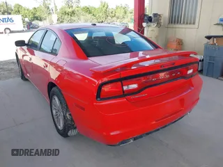 2014 Dodge Charger SXT z VIN 2C3CDXHG7EH363141, wystawiony jako IAAI lot #41381041 z przebiegiem 189 007 mil mil oraz . Historia ofert i sprzedaży dostępna na DreamBid. Obrazek 3.