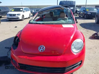 2013 Volkswagen Beetle 2.5L w/Sun/Sound/Nav with VIN 3VWJX7AT0DM673162, listed as a IAAI auction lot 41336320 with Not Provided miles and . Bid and sale history available at DreamBid. Image 12.