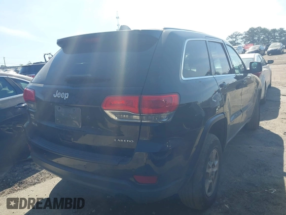 2017 Jeep Grand Cherokee Laredo with VIN 1C4RJFAG5HC793244, listed as a IAAI auction lot 41904575 with 299,722 mi miles. Bid and sale history available at carsss.com. Image 4.