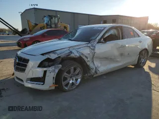 2014 Cadillac CTS Performance RWD with VIN 1G6AS5S35E0127761, listed as a Copart auction lot 83462174 with 103,344 mi miles and Salvage Title. Bid and sale history available at DreamBid. Image 1.