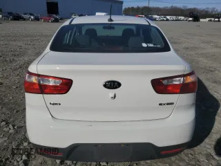 2014 Kia Rio EX z VIN KNADN4A39E6375275, wystawiony jako Copart lot #47278305 z przebiegiem 101 571 mil mil oraz Szkoda całkowita • Salvage title. Historia ofert i sprzedaży dostępna na DreamBid. Obrazek 6.