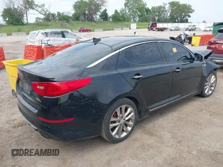 2014 Kia Optima SX Turbo with VIN 5XXGR4A65EG276131, listed as a IAAI auction lot 42429004 with 136,766 mi miles and . Bid and sale history available at DreamBid. Image 4.