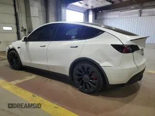2022 Tesla Model Y Performance with VIN 7SAYGDEF7NF520825, listed as a Copart auction lot 57400245 with 55,437 mi miles and Salvage title. Bid and sale history available at DreamBid. Image 2.