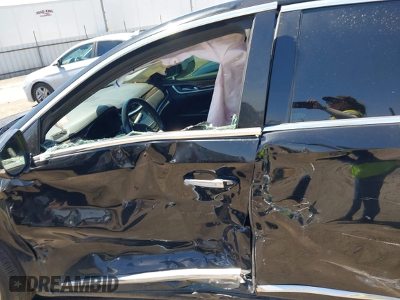 2013 Cadillac XTS Luxury z VIN 2G61R5S32D9226506, wystawiony jako IAAI lot #42208105 z przebiegiem 140 255 mil mil oraz . Historia ofert i sprzedaży dostępna na DreamBid. Obrazek 19.