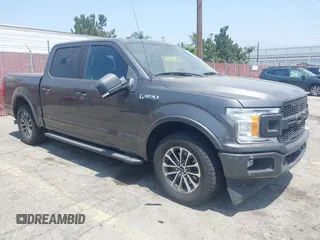 2018 Ford F-150 XL with VIN 1FTEW1CPXJKD56562, listed as a IAAI auction lot 42588371 with 137,496 mi miles and . Bid and sale history available at DreamBid. Image 1.
