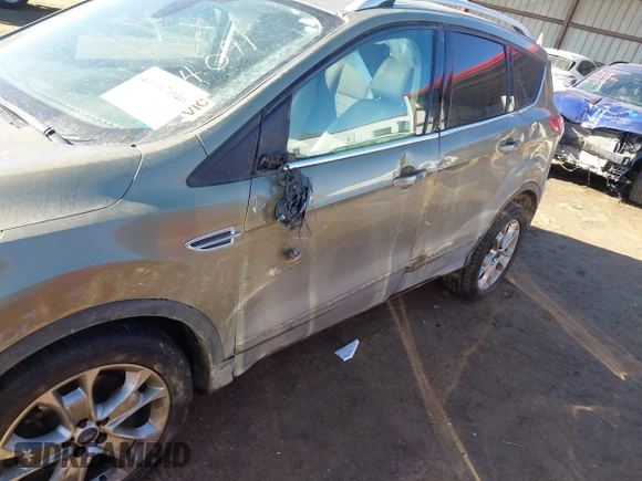 2014 Ford Escape Titanium with VIN 1FMCU9J96EUA15990, listed as a IAAI auction lot 41667046 with 203,202 mi miles. Bid and sale history available at carsss.com. Image 6.