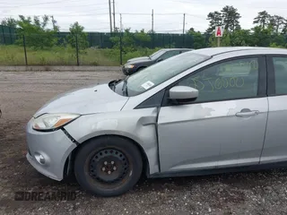 2012 Ford Focus SE with VIN 1FAHP3F29CL353872, listed as a IAAI auction lot 42528943 with Not provided miles and . Bid and sale history available at DreamBid. Image 13.