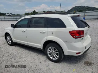 2013 Dodge Journey SXT with VIN 3C4PDDBG5DT615205, listed as a Copart auction lot 66553265 with 140,306 mi miles and Clean title. Bid and sale history available at DreamBid. Image 2.