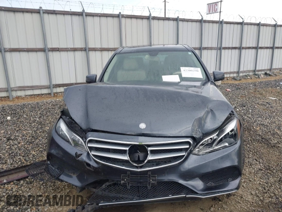 2014 Mercedes-Benz E 350 Sport with VIN WDDHF5KB7EA779952, listed as a IAAI auction lot 42308290 with 100,000 mi miles and . Bid and sale history available at DreamBid. Image 6.