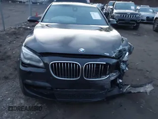 2015 BMW 7 Series 740Li xDrive with VIN WBAYF4C51FGS99074, listed as a IAAI auction lot 41222498 with 132,789 mi miles. Bid and sale history available at carsss.com. Image 6.