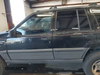 1995 Jeep Grand Cherokee Laredo z VIN 1J4GZ58Y3SC670696, wystawiony jako IAAI lot #42530934 z przebiegiem 165 658 mil mil oraz . Historia ofert i sprzedaży dostępna na DreamBid. Obrazek 14.