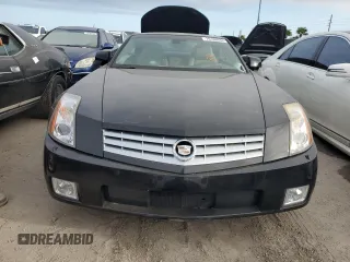 2005 Cadillac XLR z VIN 1G6YV34A955600425, wystawiony jako Copart lot #76188034 z przebiegiem Nie podano mil oraz Szkody całkowita. Historia ofert i sprzedaży dostępna na DreamBid. Obrazek 5.