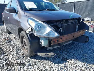 2015 Nissan Versa SV with VIN 3N1CN7AP6FL827678, listed as a IAAI auction lot 41422007 with 164,141 mi miles. Bid and sale history available at carsss.com. Image 14.