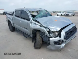 2023 Toyota Tacoma SR5 z VIN 3TMAZ5CN7PM204669, wystawiony jako IAAI lot #41961545 z przebiegiem 37 738 mil mil oraz . Historia ofert i sprzedaży dostępna na DreamBid. Obrazek 1.