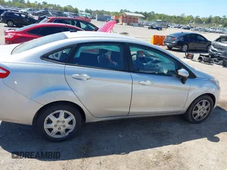 2017 Ford Fiesta S z VIN 3FADP4AJ0HM171227, wystawiony jako IAAI lot #41878411 z przebiegiem 88 558 mil mil oraz . Historia ofert i sprzedaży dostępna na DreamBid. Obrazek 13.