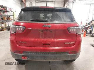 2021 Jeep Compass Trailhawk z VIN 3C4NJDDBXMT586981, wystawiony jako IAAI lot #42116028 z przebiegiem 70 317 mil mil oraz . Historia ofert i sprzedaży dostępna na DreamBid. Obrazek 17.