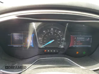 2013 Ford Fusion SE Hybrid z VIN 3FA6P0LU8DR295297, wystawiony jako Copart lot #61830065 z przebiegiem 190 096 mil mil oraz Czysty tytuł • Clean title. Historia ofert i sprzedaży dostępna na DreamBid. Obrazek 9.