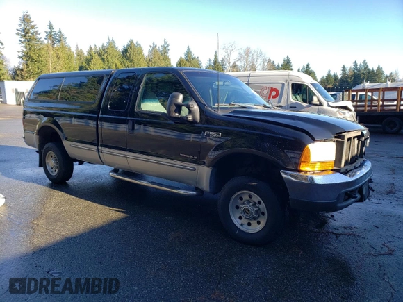 1999 Ford F-350 XL z VIN 1FTSX31F0XEC31633, wystawiony jako Copart lot #84082754 z przebiegiem 192 085 mil mil oraz Szkoda całkowita • Salvage title. Historia ofert i sprzedaży dostępna na DreamBid. Obrazek 4.