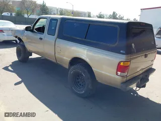 1999 Ford Ranger XL with VIN 1FTYR14X9XTA59675, listed as a IAAI auction lot 41861165 with 208,928 mi miles. Bid and sale history available at carsss.com. Image 3.