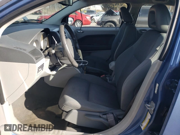 2007 Dodge Caliber R/T z VIN 1B3HB78K07D243730, wystawiony jako Copart lot #87064294 z przebiegiem 201 196 mil mil oraz Tytuł czysty. Historia ofert i sprzedaży dostępna na DreamBid. Obrazek 7.