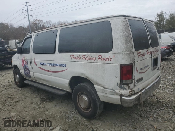 2006 Ford Econoline Passenger XL with VIN 1FBNE31L36HA02924, listed as a Copart auction lot 79903244 with 217,831 mi miles and Salvage title. Bid and sale history available at DreamBid. Image 2.