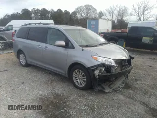 2014 Toyota Sienna XLE with VIN 5TDYK3DC0ES421501, listed as a IAAI auction lot 41672414 with 111,911 mi miles. Bid and sale history available at carsss.com. Image 1.