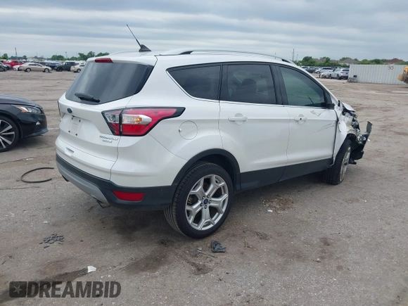 2018 Ford Escape Titanium with VIN 1FMCU0J96JUD36806, listed as a IAAI auction lot 42198506 with 50,710 mi miles and . Bid and sale history available at DreamBid. Image 4.
