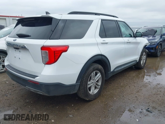 2023 Ford Explorer XLT with VIN 1FMSK7DH9PGB19853, listed as a IAAI auction lot 41568203 with 30,094 mi miles. Bid and sale history available at carsss.com. Image 4.