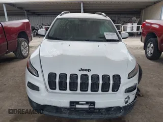 2016 Jeep Cherokee Latitude with VIN 1C4PJLCB5GW207159, listed as a IAAI auction lot 41232649 with 103,991 mi miles. Bid and sale history available at carsss.com. Image 12.