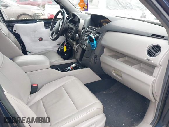 2012 Honda Pilot EX-L with VIN 5FNYF4H52CB070811, listed as a IAAI auction lot 41938672 with 156,446 mi miles and . Bid and sale history available at DreamBid. Image 5.