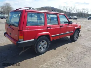 2000 Jeep Cherokee Police with VIN 1J4FF48S3YL240637, listed as a IAAI auction lot 41978145 with 219,502 mi miles. Bid and sale history available at carsss.com. Image 4.