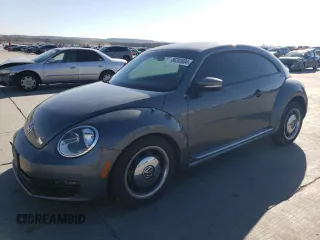 2016 Volkswagen Beetle Wolfsburg Edition with VIN 3VWF17ATXGM633649, listed as a Copart auction lot 86283604 with 75,412 mi miles and Salvage Title. Bid and sale history available at DreamBid. Image 1.