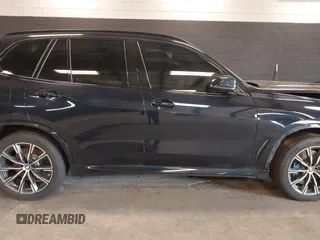 2023 BMW X5 M50i z VIN 5UXJU4C06P9R40495, wystawiony jako IAAI lot #42162049 z przebiegiem 57 179 mil mil oraz . Historia ofert i sprzedaży dostępna na DreamBid. Obrazek 14.