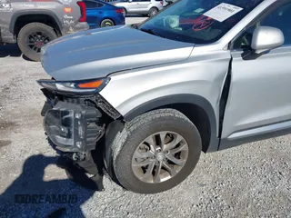 2019 Hyundai Santa Fe SE with VIN 5NMS2CAD4KH109117, listed as a IAAI auction lot 41591901 with 133,338 mi miles. Bid and sale history available at carsss.com. Image 6.