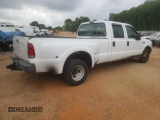 1999 Ford F-350 XL with VIN 1FTWW32FXXEB79284, listed as a Copart auction lot 53969905 with 241,082 mi miles and Salvage title. Bid and sale history available at DreamBid. Image 3.
