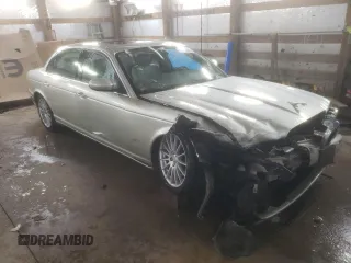 2006 Jaguar XJ with VIN SAJWA79B56SH07388, listed as a Copart auction lot 80636334 with 134,608 mi miles and Salvage Title. Bid and sale history available at carsss.com. Image 4.