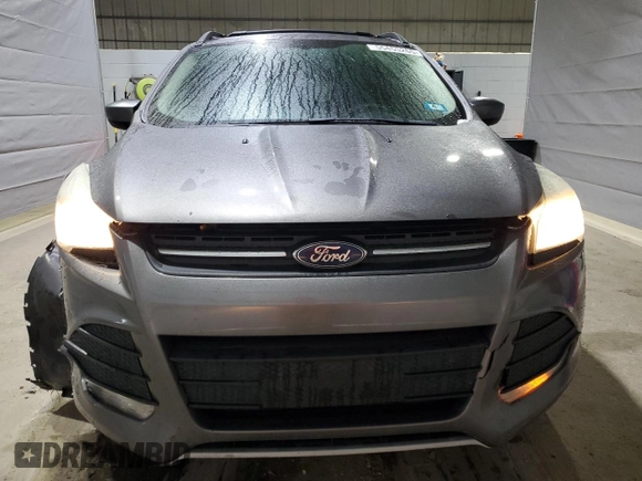 2013 Ford Escape SE z VIN 1FMCU9G98DUB42469, wystawiony jako Copart lot #55455265 z przebiegiem 151 975 mil mil oraz Szkoda całkowita • Salvage title. Historia ofert i sprzedaży dostępna na DreamBid. Obrazek 5.