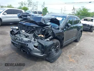 2025 Mazda CX-50 S Select with VIN 7MMVABAMXSN326118, listed as a IAAI auction lot 42136197 with 5,142 mi miles and . Bid and sale history available at DreamBid. Image 2.