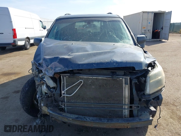 2006 Honda Pilot EX-L with VIN 5FNYF18656B012252, listed as a IAAI auction lot 41801738 with 246,191 mi miles and . Bid and sale history available at DreamBid. Image 13.